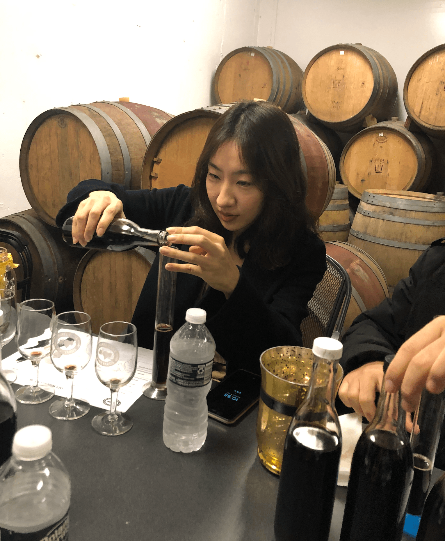 Young Lim Lee pouring Ozymandias Wine at a New York Academy of Art event